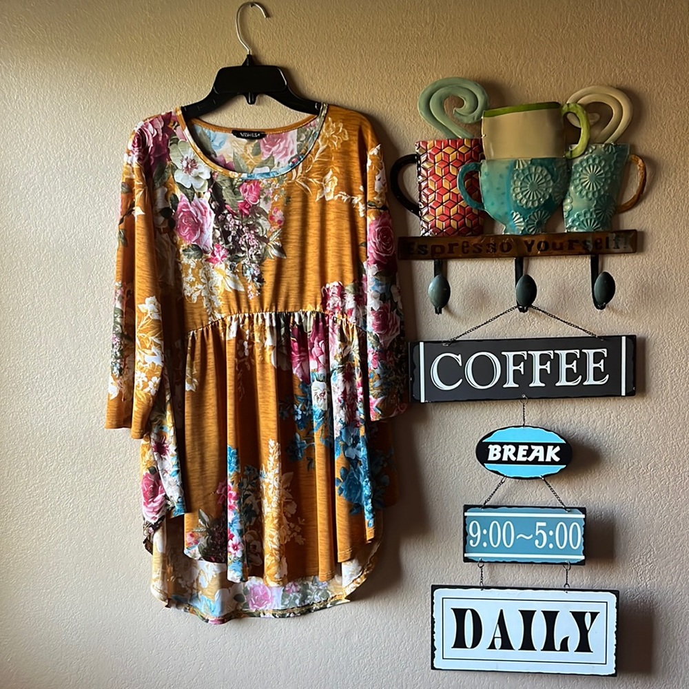Woman’s hi low 3/4 sleeve top